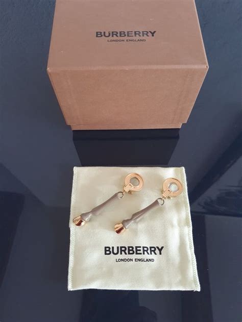 burberry ohrclips|Burberry signatures for men.